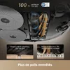 Close-up view of the underside of a robot vacuum cleaner, highlighting its brushes and mopping system, with inset images demonstrating brush performance on different surfaces. Produktbild-Vorschau