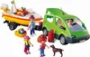 A Playmobil family van with a boat trailer, figures, and accessories. Podgląd zdjęcia produktu