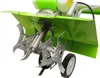 Close-up view of the tilling mechanism and wheels of a green and silver rototiller, isolated on a white background. Voir les images du produit