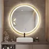 A modern bathroom vanity with a round LED mirror, sink, and faucet. Produktbild-Vorschau