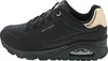 A studio shot of a single black Skechers sneaker with gold accents. Anteprima dell’immagine prodotto