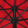 Close-up view of the internal structure of a red umbrella. Anteprima dell’immagine prodotto