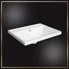 A white rectangular sink is shown against a black background with a gold border. Voir les images du produit