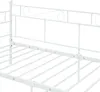 A close-up view of a white metal daybed frame. Podgląd zdjęcia produktu