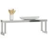 A stainless steel shelf with kitchen utensils and a bowl on top, against a white background. Anteprima dell’immagine prodotto