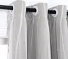 A close-up view of gray curtains with white sheer overlay and star details, hanging from a black curtain rod. Anteprima dell’immagine prodotto