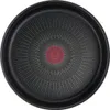 The bottom of a black frying pan with a red circular logo and radiating lines. Anteprima dell’immagine prodotto