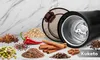 A collection of spices, nuts, grains, and a coffee grinder. Podgląd zdjęcia produktu