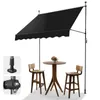 A black awning is set up over a small round table with two wooden bar stools. Náhľad obrázku produktu