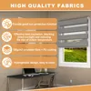 A desk with a laptop and a window with roller blinds. Produktbild-Vorschau
