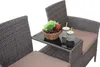 A close-up view of a poly-rattan seating set with a small table holding fruit and drinks. Anteprima dell’immagine prodotto