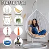 A collage of different items that can be hung, with a woman sitting in a white hanging chair in the main image. Produktbild-Vorschau