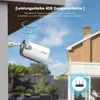 An outdoor security camera is mounted on a wall, with animated signal waves emanating from its antennas. A router is shown in a smaller inset image. Náhled obrázku produktu
