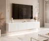 A modern living room with a wall-mounted TV and media console. Produktbild-Vorschau