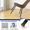 A chair with brown upholstery and black metal legs is shown on a light wood floor. The bottom of the legs have protectors. The image includes text overlays and inset images explaining the product's features. Produktbild-Vorschau
