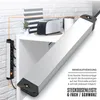 A power strip is shown mounted on a shelf, with a toaster and a plant on the shelf. Voir les images du produit