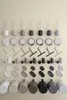 A collection of bathroom accessories arranged in rows against a plain background. Produktbild-Vorschau