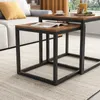 Nesting tables in a living room setting with a sofa and rug. Podgląd zdjęcia produktu