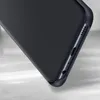 A close-up view of the bottom edge of a black phone case, showing ports and speaker grilles. Produktbild-Vorschau