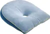 A light blue cushion with a hole in the center, on a white background. Produktbild-Vorschau
