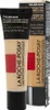 A product shot of a foundation tube and its packaging. Podgląd zdjęcia produktu