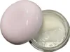 A cosmetic cream in a jar with its lid partially off. Produktbild-Vorschau