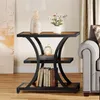 A 3-tier side table with books, a lamp, and a decorative pumpkin candle holder. Produktbild-Vorschau