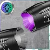 Two black flashlights, one emitting purple light, are shown against a concrete background with a circular icon of a lightbulb. Produktbild-Vorschau