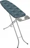 An ironing board with a patterned cover and a metal iron rest, set against a white background. Náhled obrázku produktu