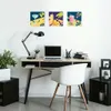 A modern home office setup with a desk, laptop, lamp, and decorative artwork. Produktbild-Vorschau
