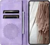 A purple flip phone case with a mandala design and card slots is shown open, revealing a phone with a scarf in the background. Produktbild-Vorschau