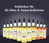 A collection of whisky bottles displayed in a line against a dark, patterned background. Produktbild-Vorschau