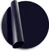 A black circular BBQ grill mat is shown, with a portion of it rolled up. Produktbild-Vorschau