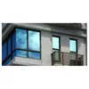 A close-up view of a modern building facade with large, reflective windows and a balcony. Produktbild-Vorschau