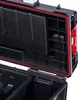 Close-up view of the interior of an open black tool case with red trim. Náhled obrázku produktu