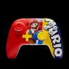 A Nintendo Switch controller with Mario graphics. Anteprima dell’immagine prodotto
