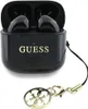 A black charging case for wireless earbuds with the Guess logo and a gold charm attached. Náhľad obrázku produktu