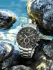 A Citizen watch is placed on rocks near water. Anteprima dell’immagine prodotto