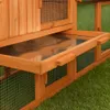 A close-up view of a wooden pet house with a metal tray and wire mesh. Produktbild-Vorschau