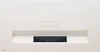 A white LG projector with a black lens is shown from the front. Produktbild-Vorschau