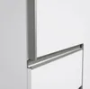 A close-up view of a white cabinet with integrated silver handles. Produktbild-Vorschau