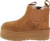 A side view of a brown UGG Neumel Chelsea Platform Boot. Voir les images du produit