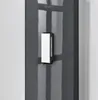 A close-up of a wall-mounted coat rack with three folding hooks, set against a dark, reflective wall with light reflections. Voir les images du produit
