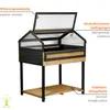 A wooden raised garden bed with a clear lid, shown outdoors against a white background with descriptive text overlays. Produktbild-Vorschau