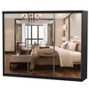 A bedroom scene reflected in the mirrored doors of a wardrobe. Produktbild-Vorschau