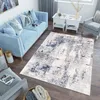 A living room scene with a light blue sofa, a rug, and side tables. Náhled obrázku produktu