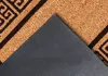 A close-up view of a doormat, showing the textured surface and the underside. Podgląd zdjęcia produktu