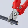 A close-up of red-handled cable cutters cutting a black cable. Produktbild-Vorschau