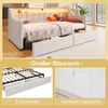 A daybed with storage drawers and LED lighting, shown in a room setting and with close-ups of its features. Voir les images du produit