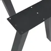 A close-up view of a black metal table base, showing the mounting plate with pre-drilled holes and the angled legs. Podgląd zdjęcia produktu
